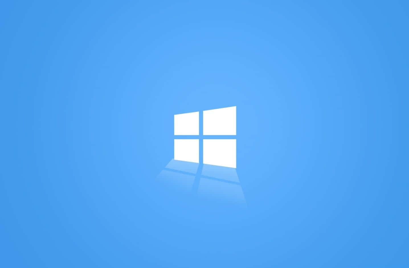 Windows Logo Blå PC Tapet: Dette smukke tapet har Windows logoet i en blå farve, der passer perfekt til ethvert kontor eller kontrolrum. Wallpaper
