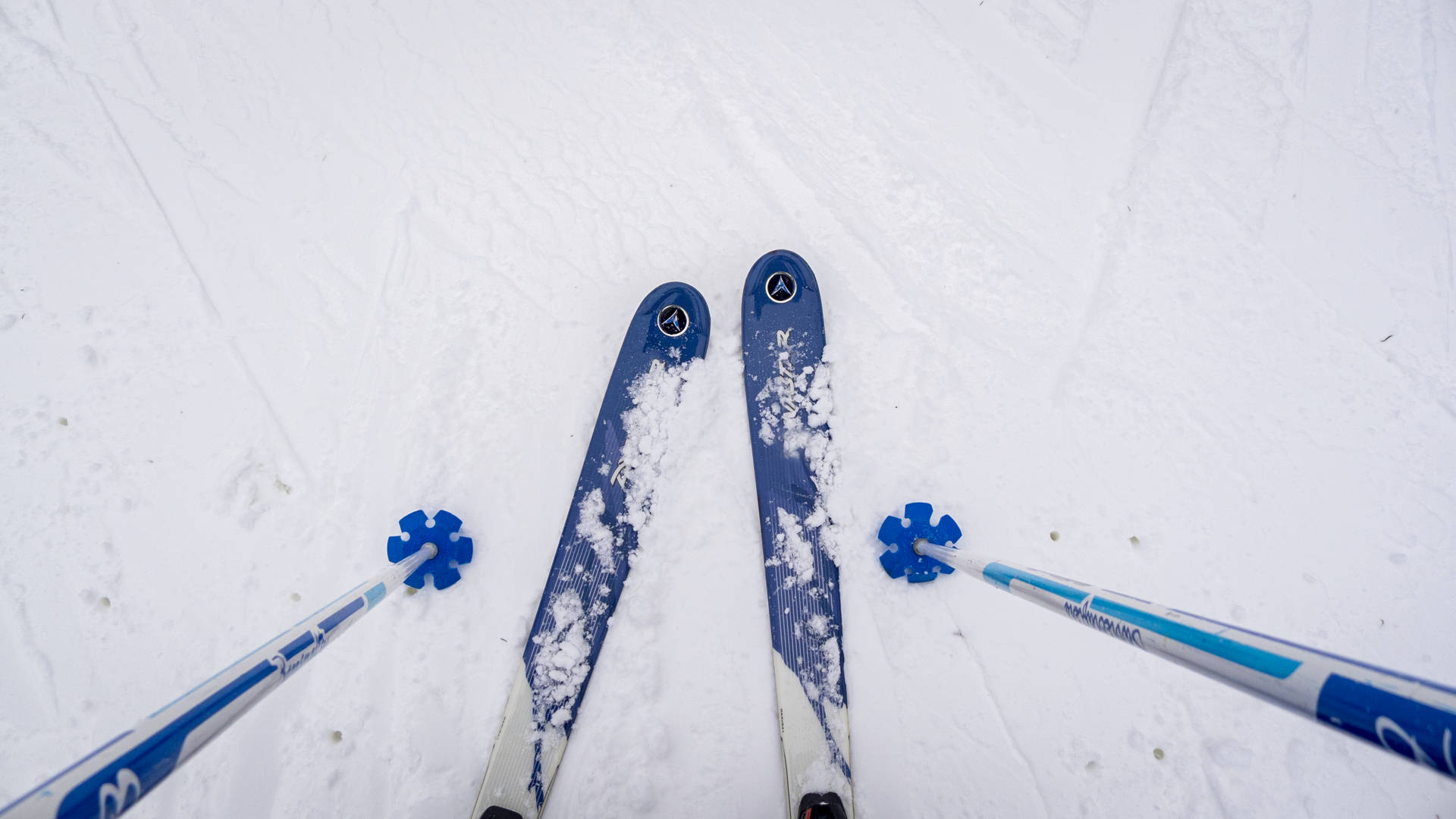 Blue Skiing Board And Poles Wallpaper