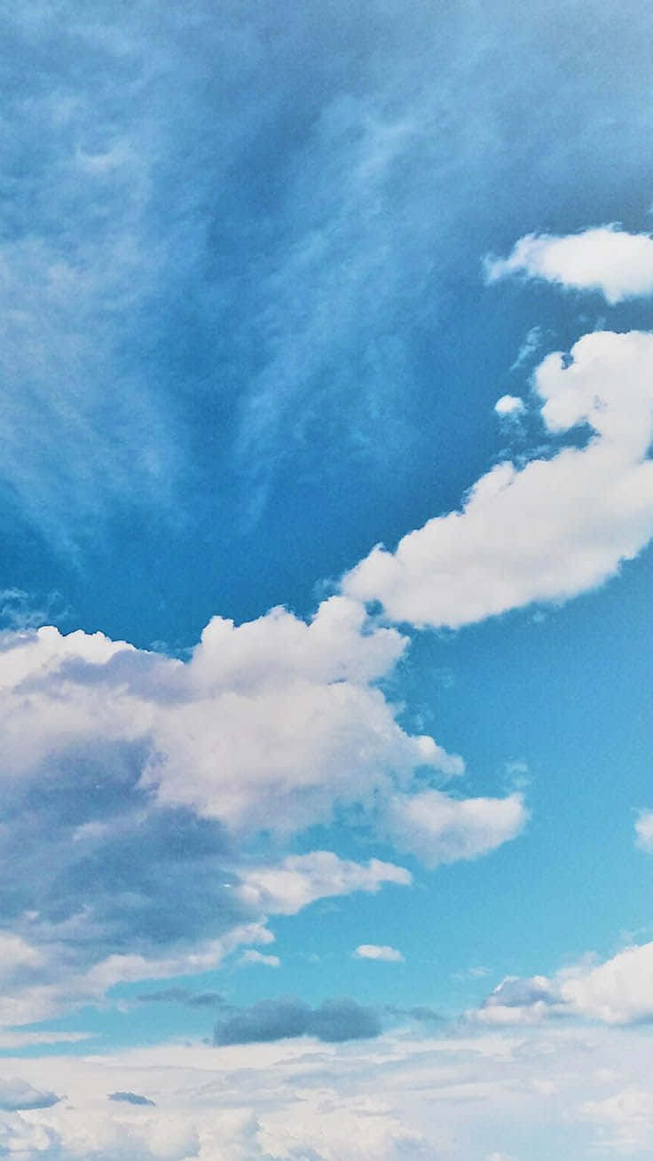 An Aesthetically Painted Blue Sky Wallpaper
