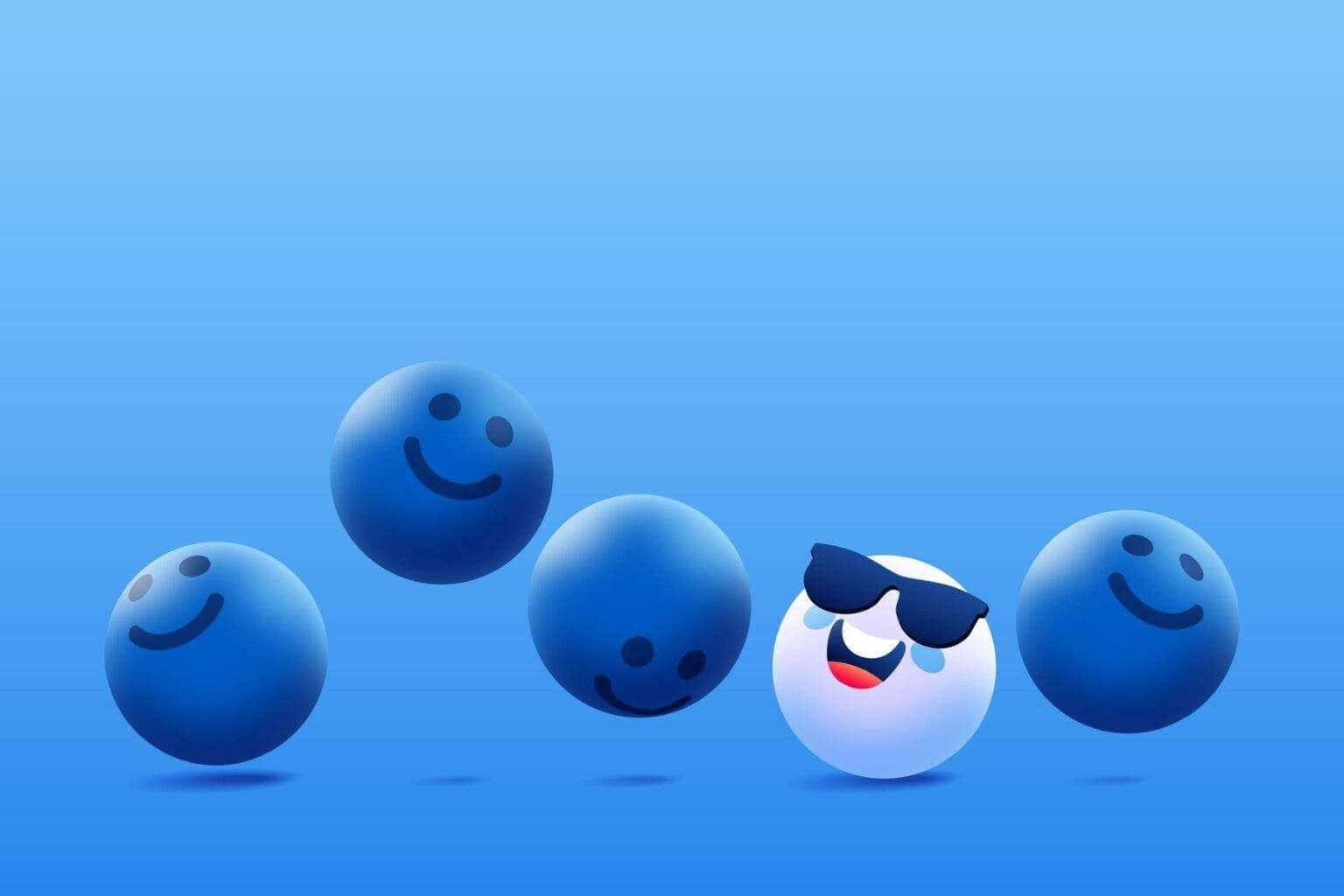 Blue Smiley Faceswith One Unique Character Wallpaper