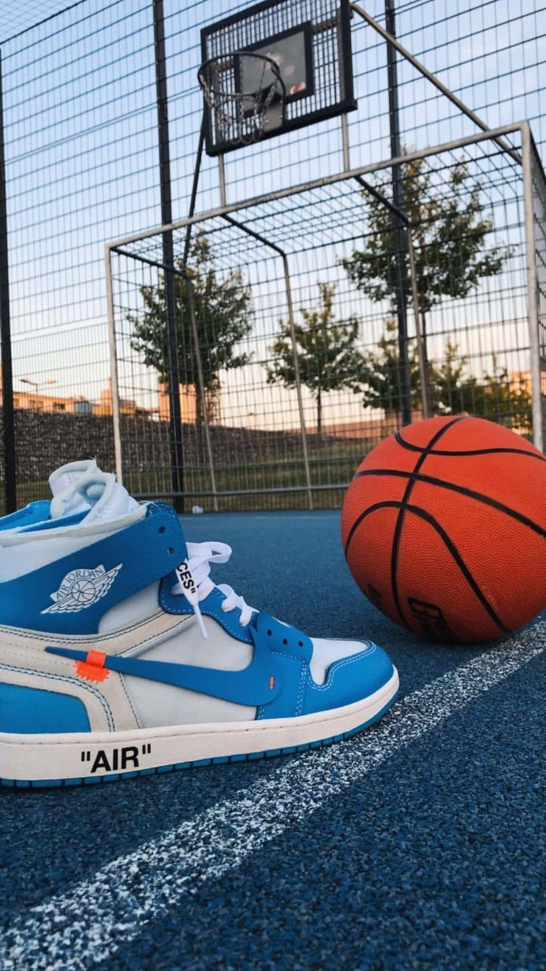 Blue Sneakers Basketball Court Evening Wallpaper