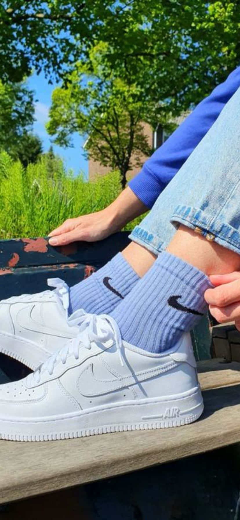 Blue Socks White Sneakers Outdoor Setting Wallpaper