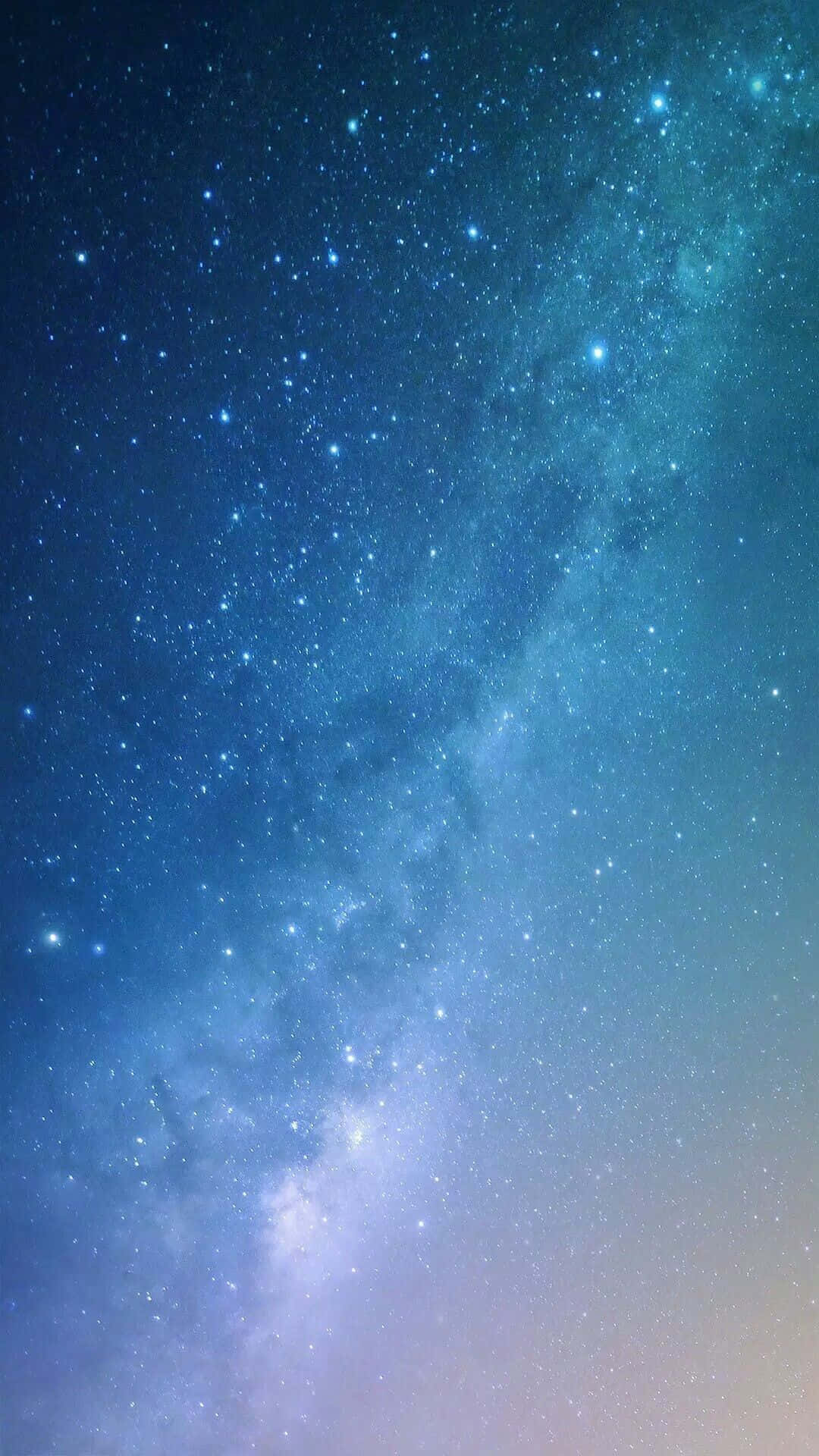 Bright blue stars sparkle in the night sky Wallpaper