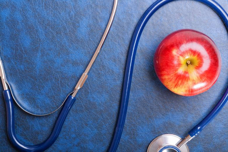 Blue Stethoscope With An Apple Wallpaper