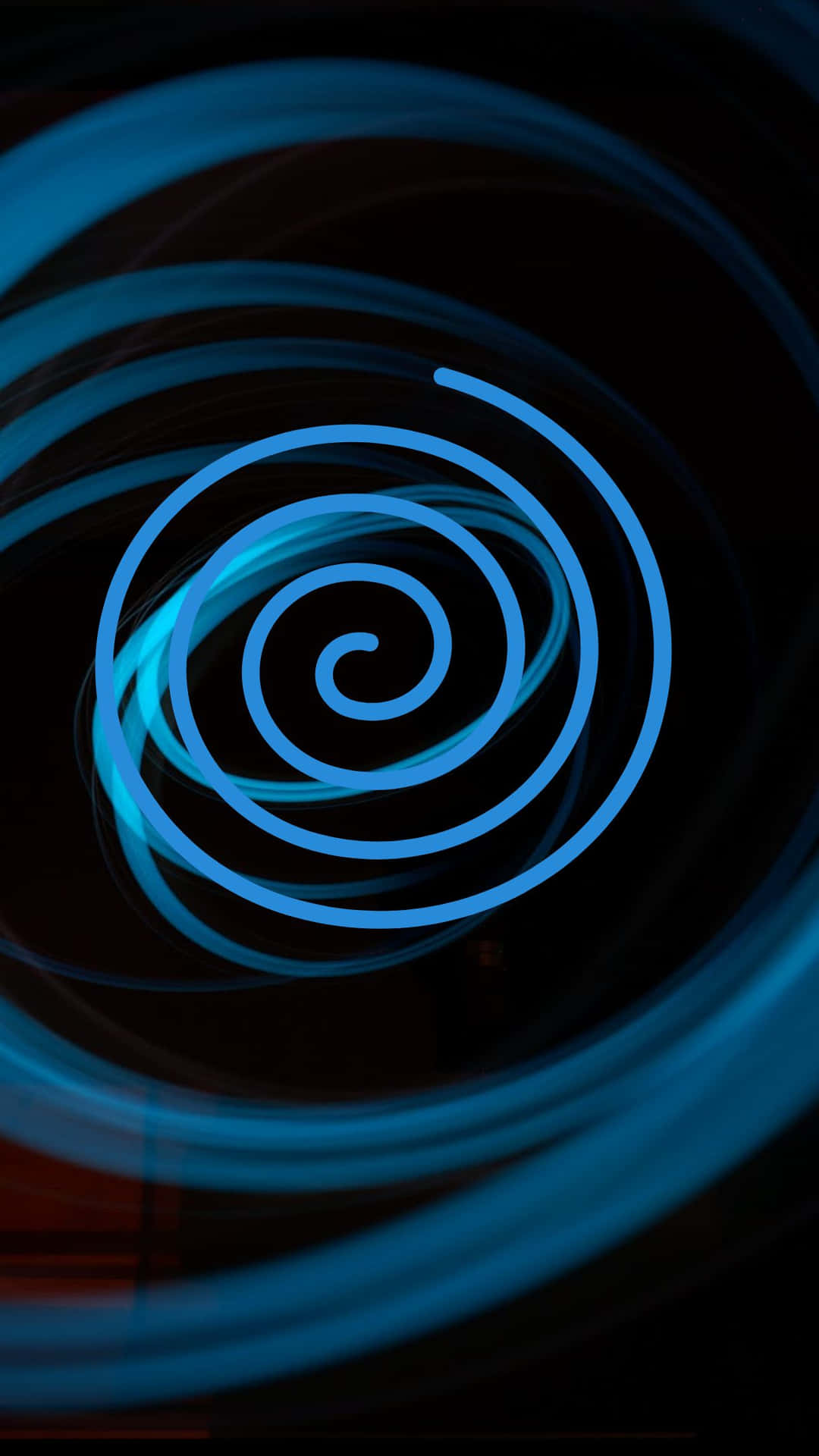 A Blue Spiral On A Black Background