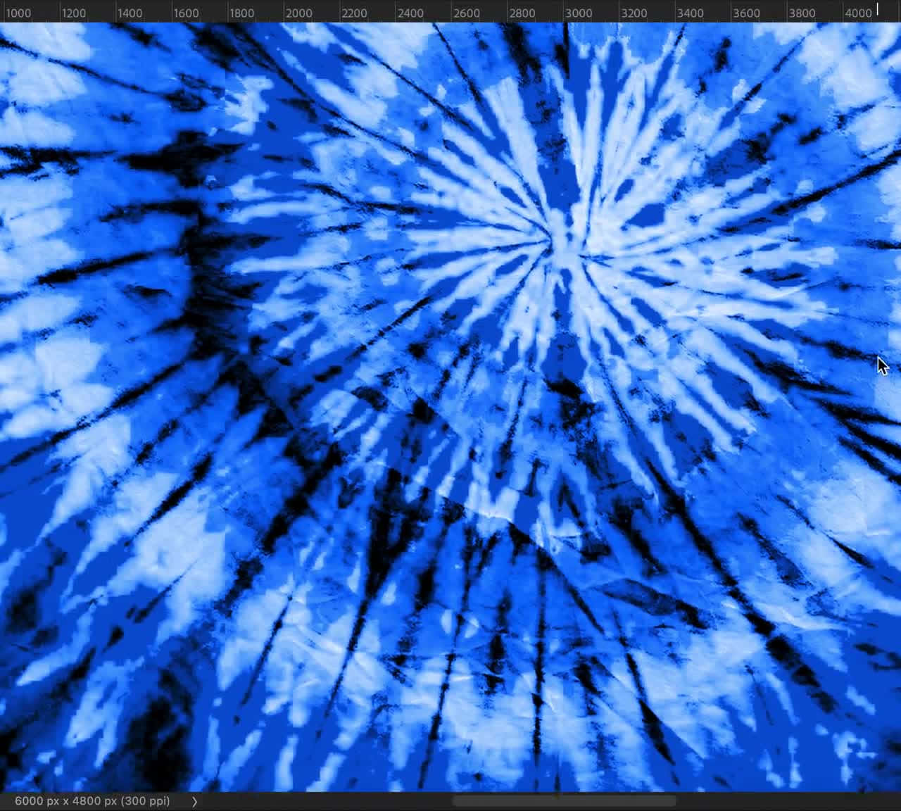 A Blue Tie Dyed Fabric With Black And White Swirls