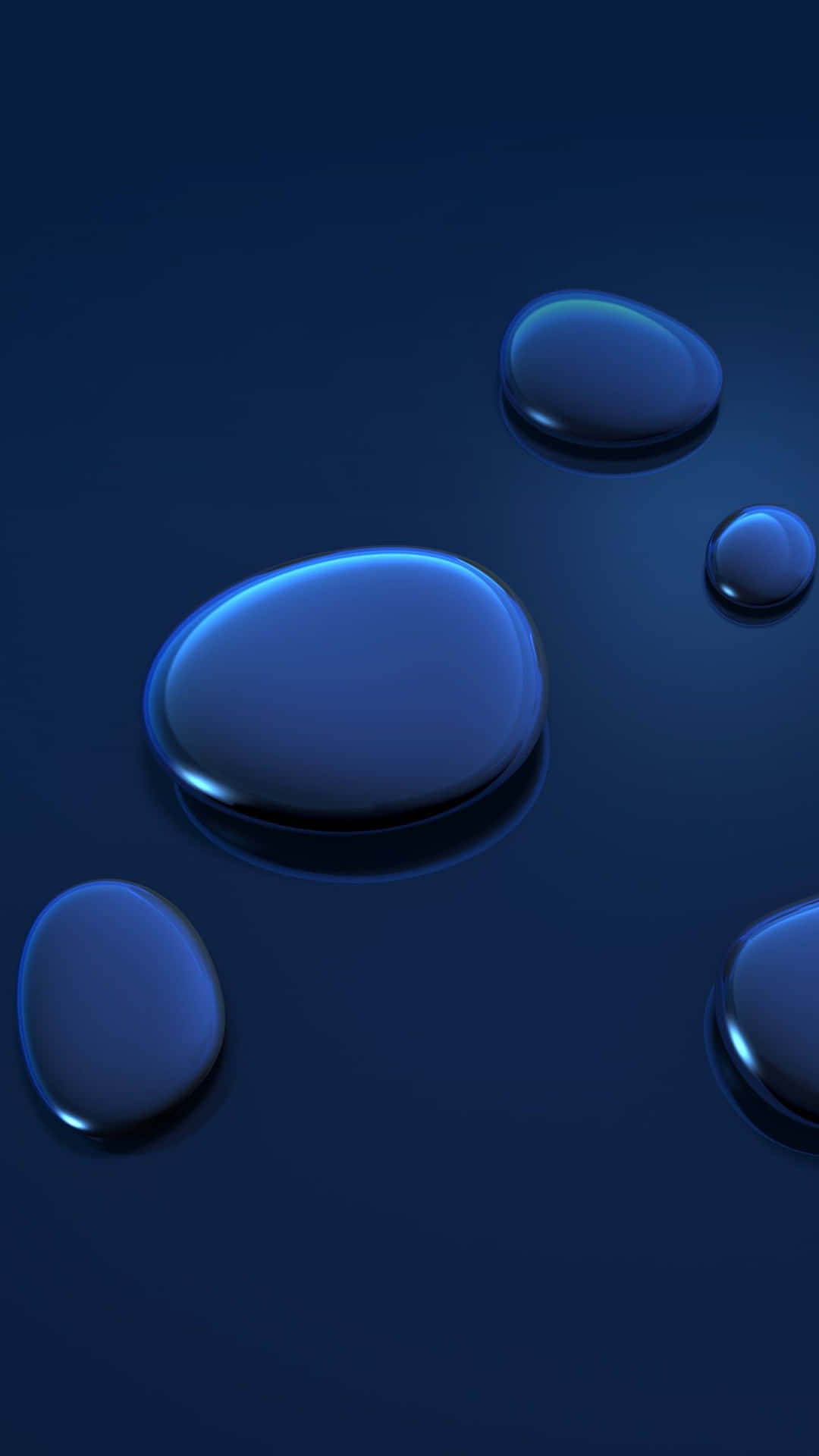 Blue Water Dropletson Dark Surface Wallpaper