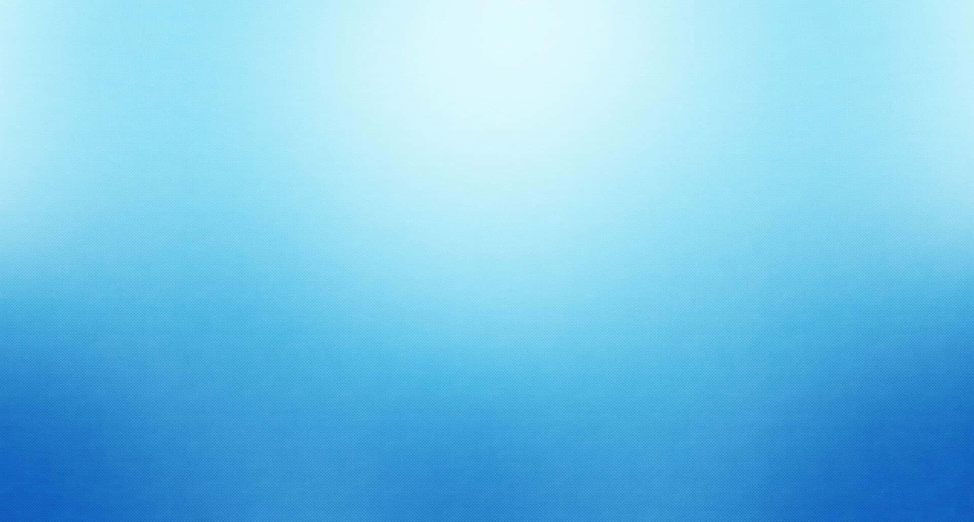 A Blue Background With A Blurred Light