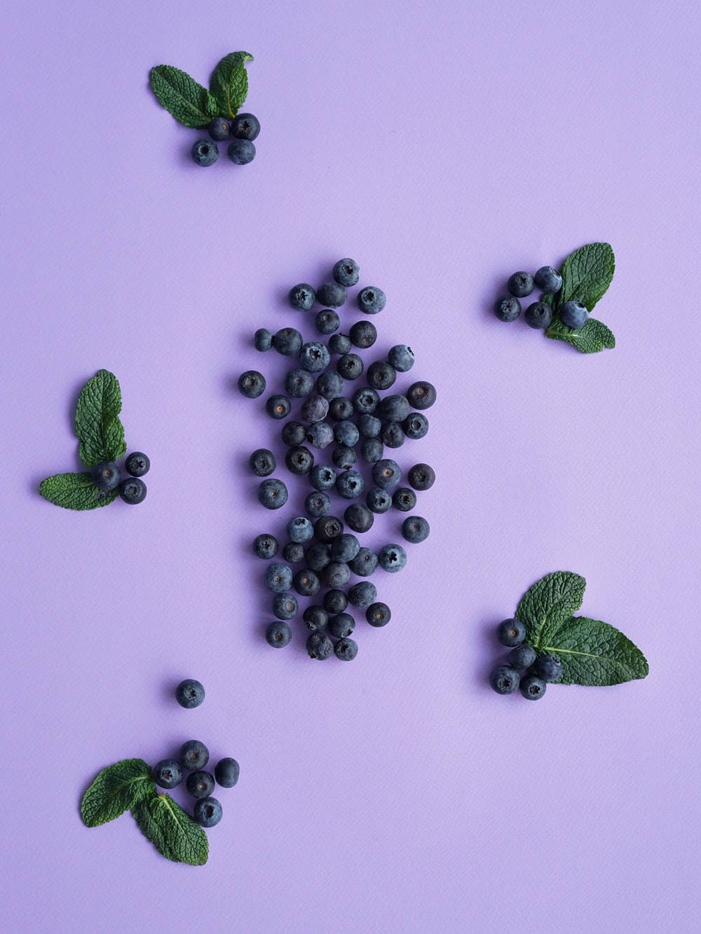 Blueberries In Aesthetic Purple Arrangement Wallpaper