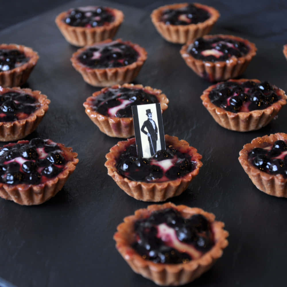 "Indulge yourself with this delicious blueberry tart!" Wallpaper