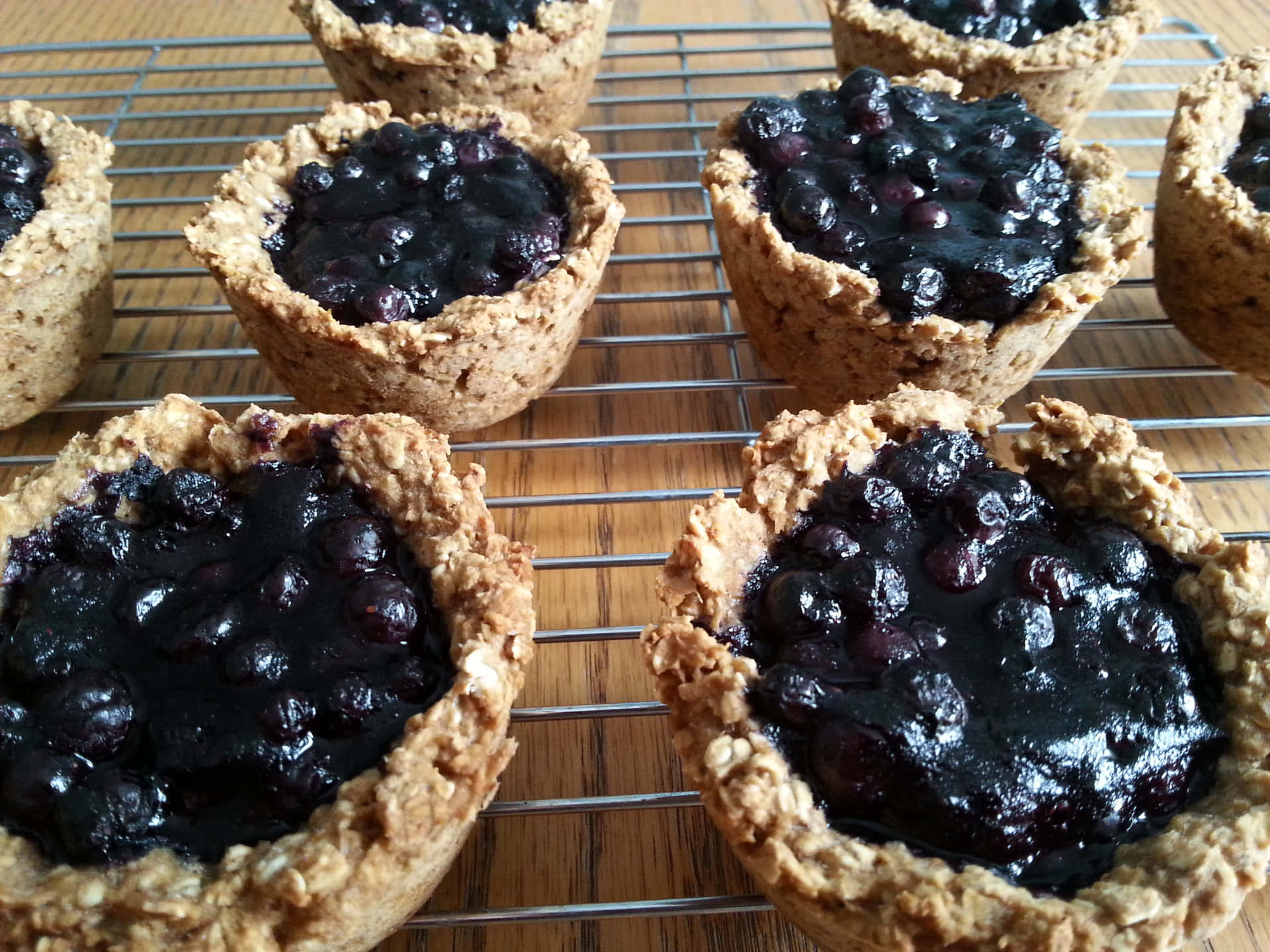 A freshly baked and delicious blueberries tart. Wallpaper