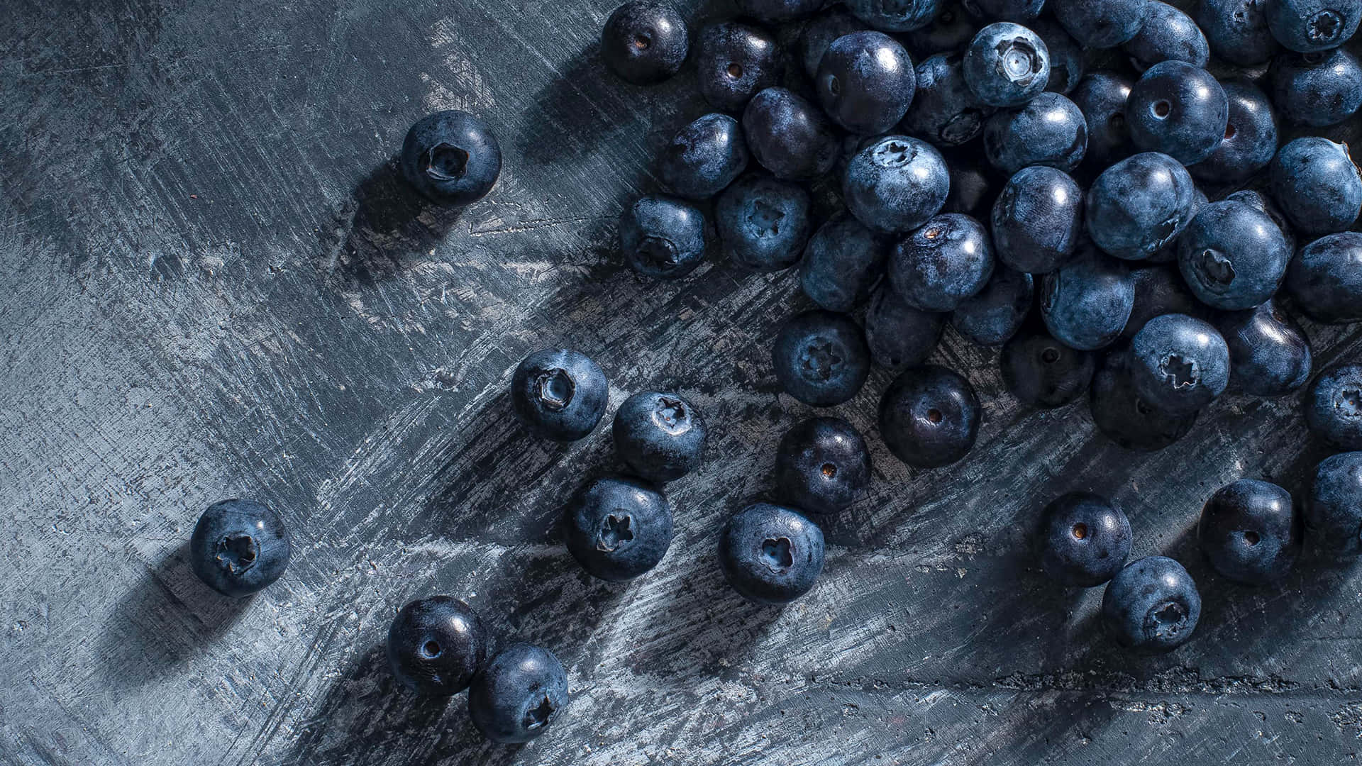 Blueberries On A Dark Wooden Table