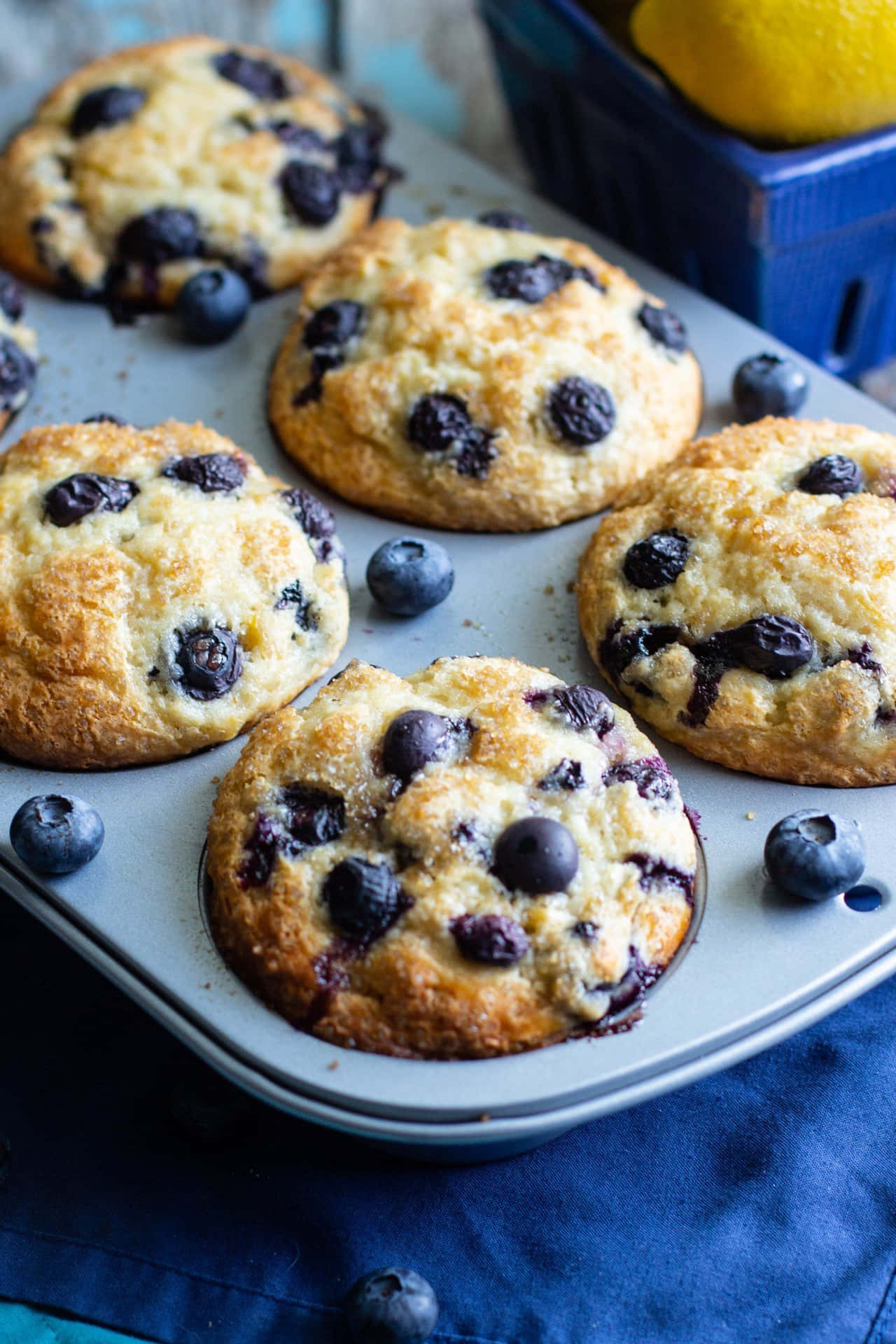 Deliciously sweet blueberry muffins, ready to snack on Wallpaper