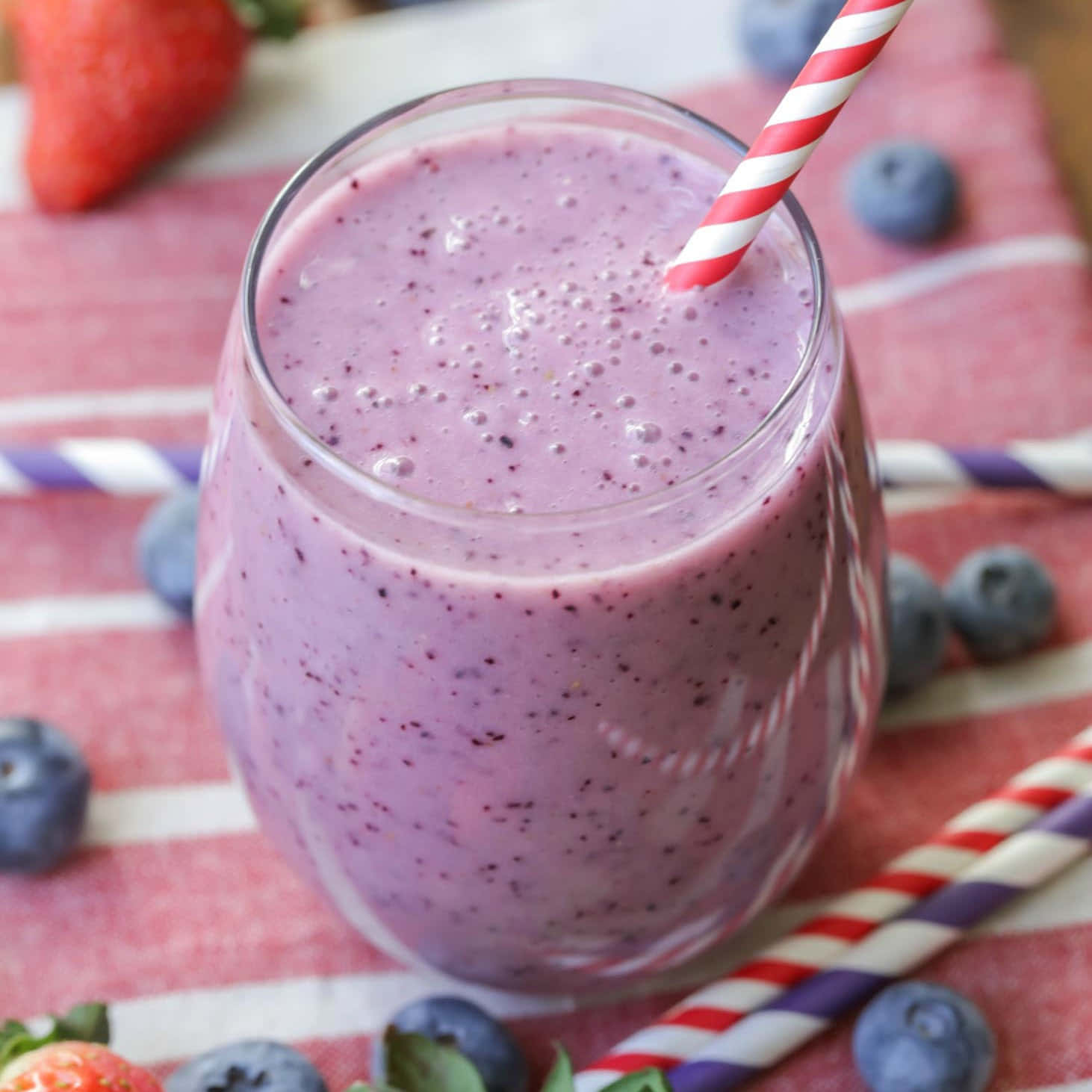 Enjoy the delicious, velvety melt-in-your-mouth goodness of a fresh, natural Blueberry Smoothie Wallpaper