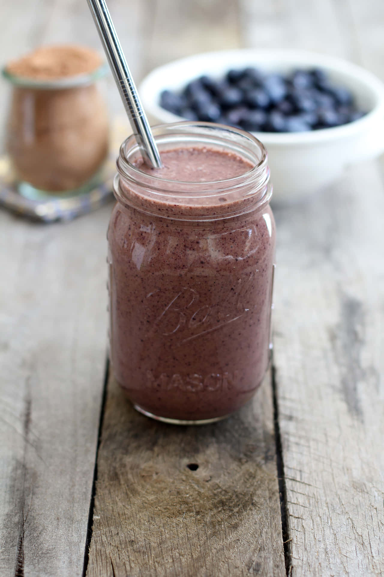 Enjoy a sweet and healthy smoothie with a combination of blueberry and milk Wallpaper