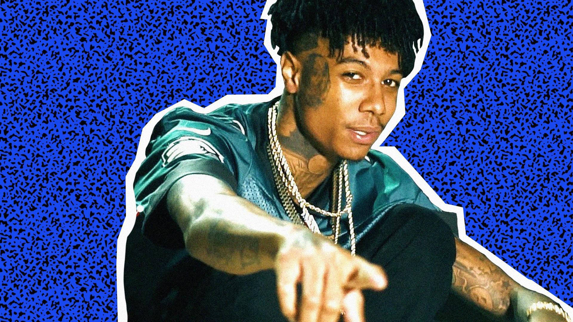 Blueface Pointing Blue Background