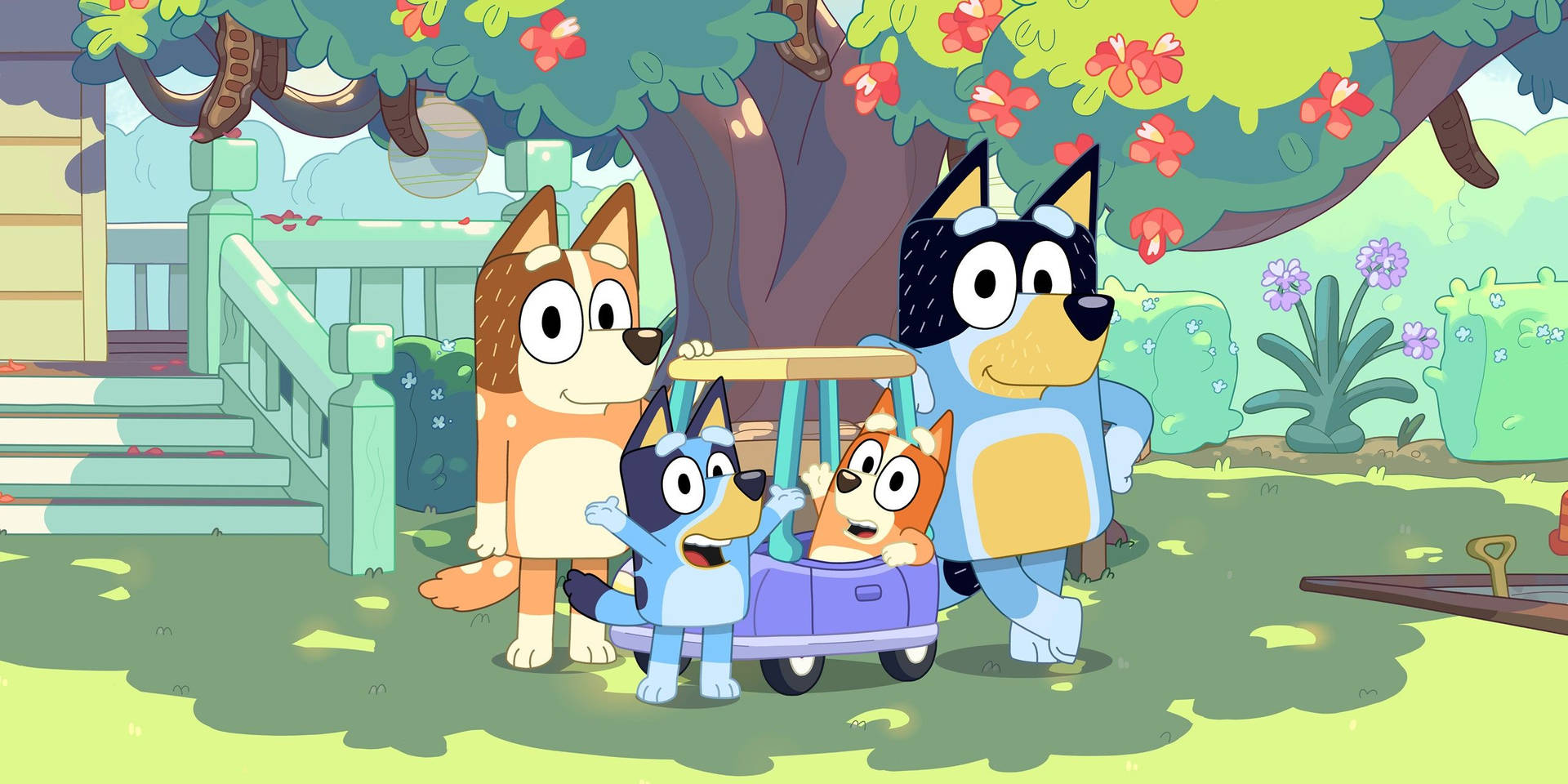 Bluey Family In Front Of House Wallpaper