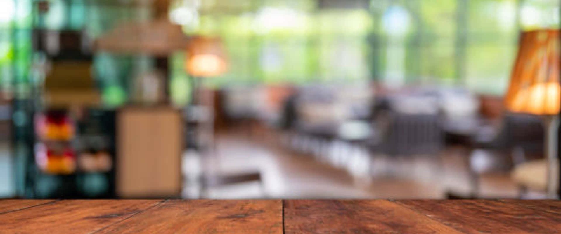 Wooden Table In A Restaurant With Blurred Background