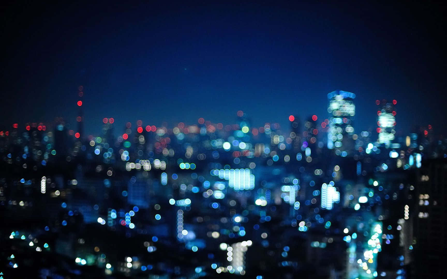 Blurry Background Bright City Lights At Nighttime 1728 x 1080 Background