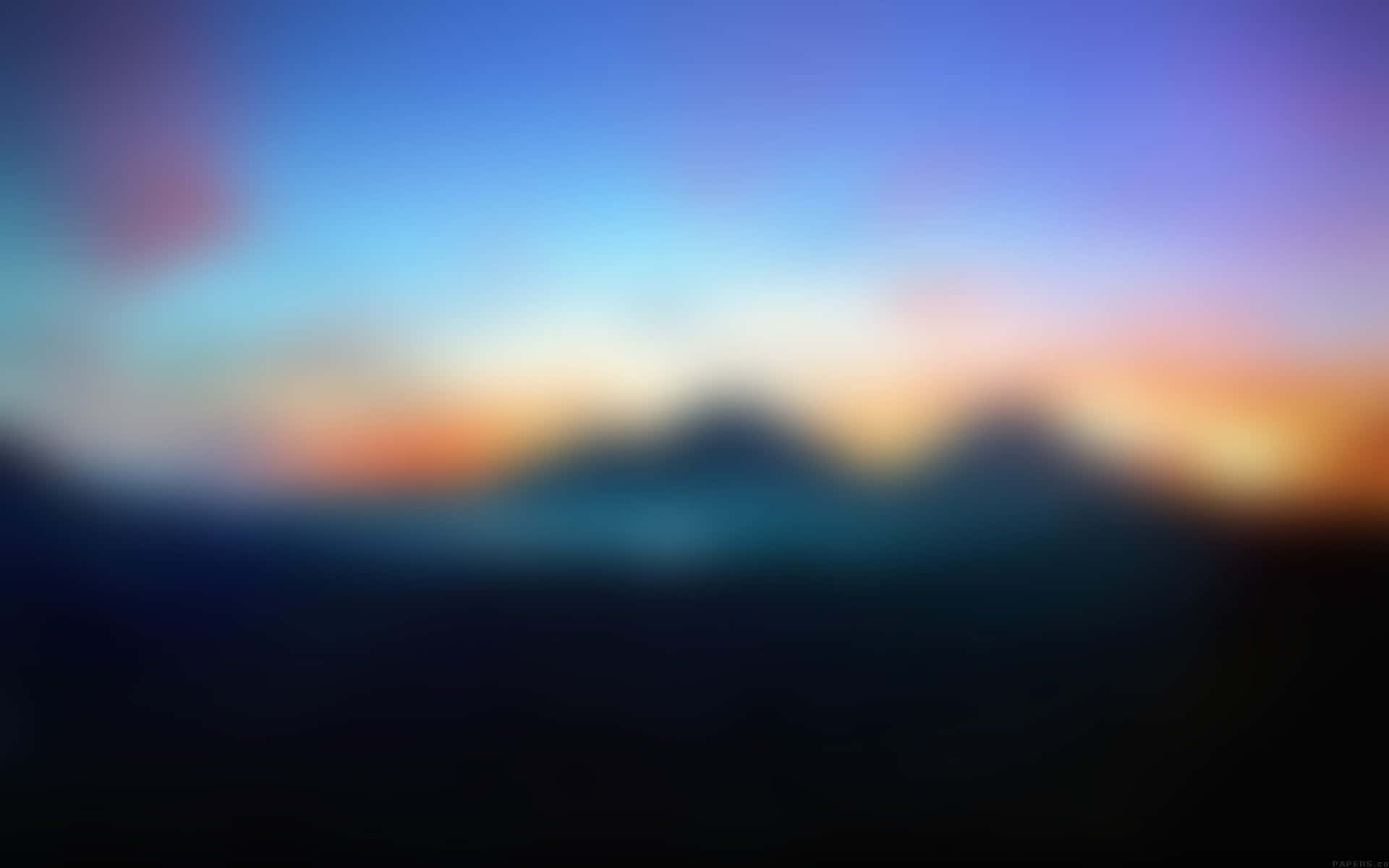 Blurry Background Mountains And A Sunset Background