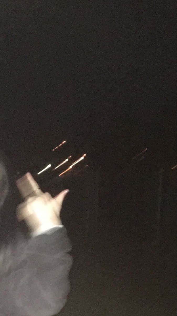 Blurry Middle Finger At Night Picture