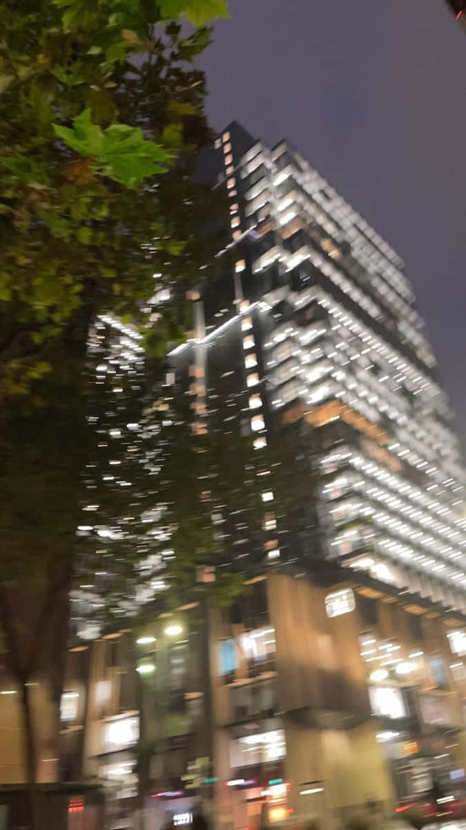 Blurry Building With White Lights Picture