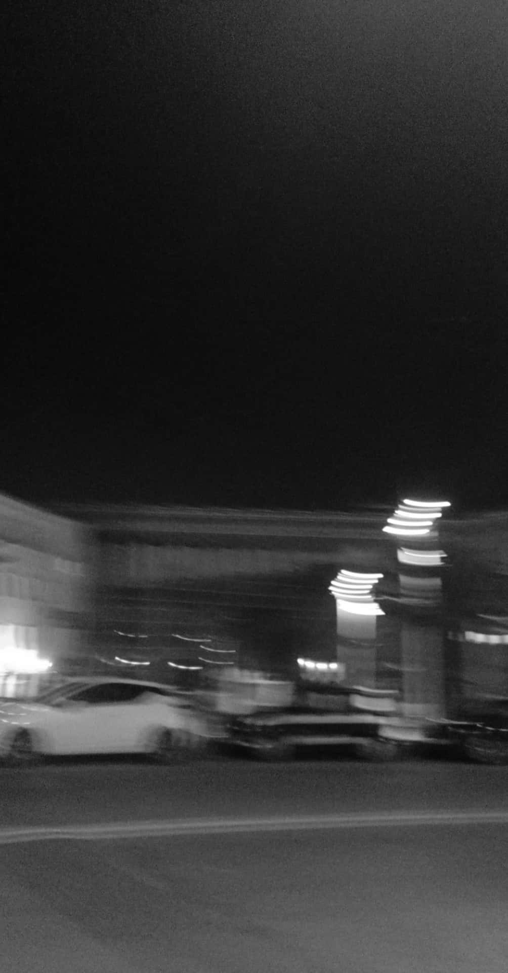 Blurry Black And White Parking Lot With Cars Picture