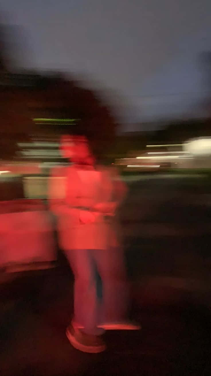 Blurry Red Aesthetic Light With Man Picture