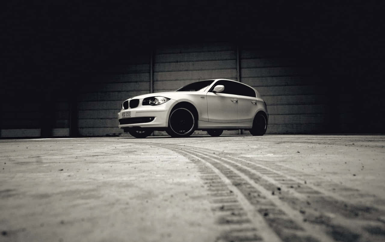 Sleek BMW 1 Series on the Road Wallpaper