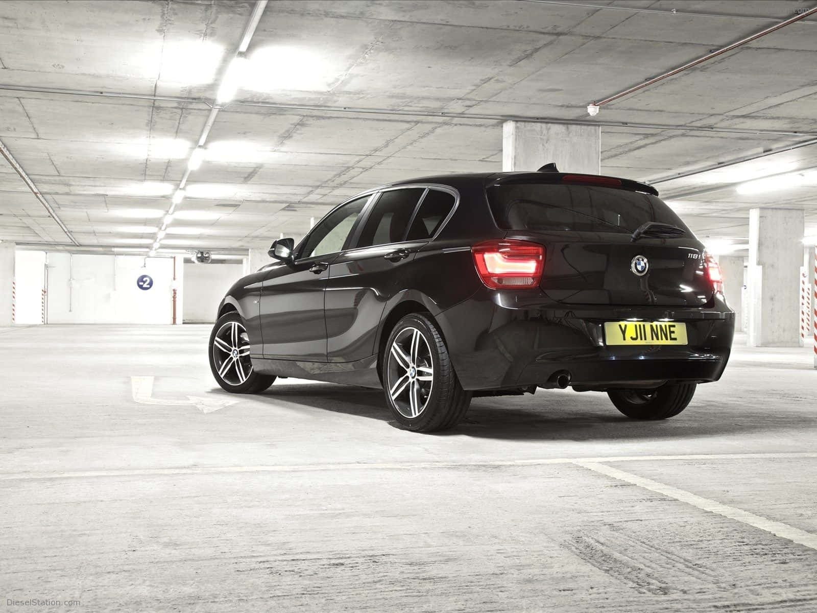Sleek and Stylish BMW 1 Series in Action Wallpaper