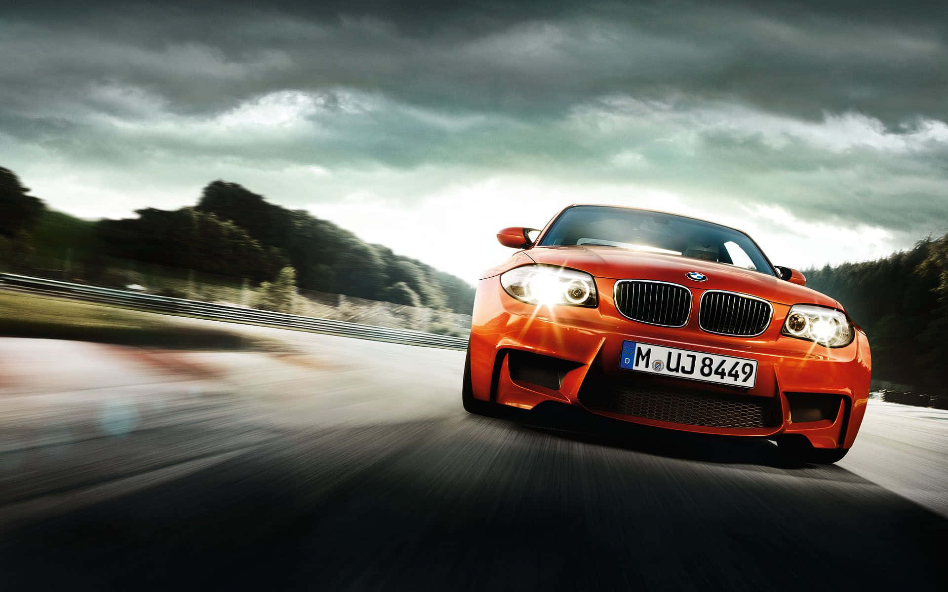 Sleek BMW 1 Series in Motion Wallpaper