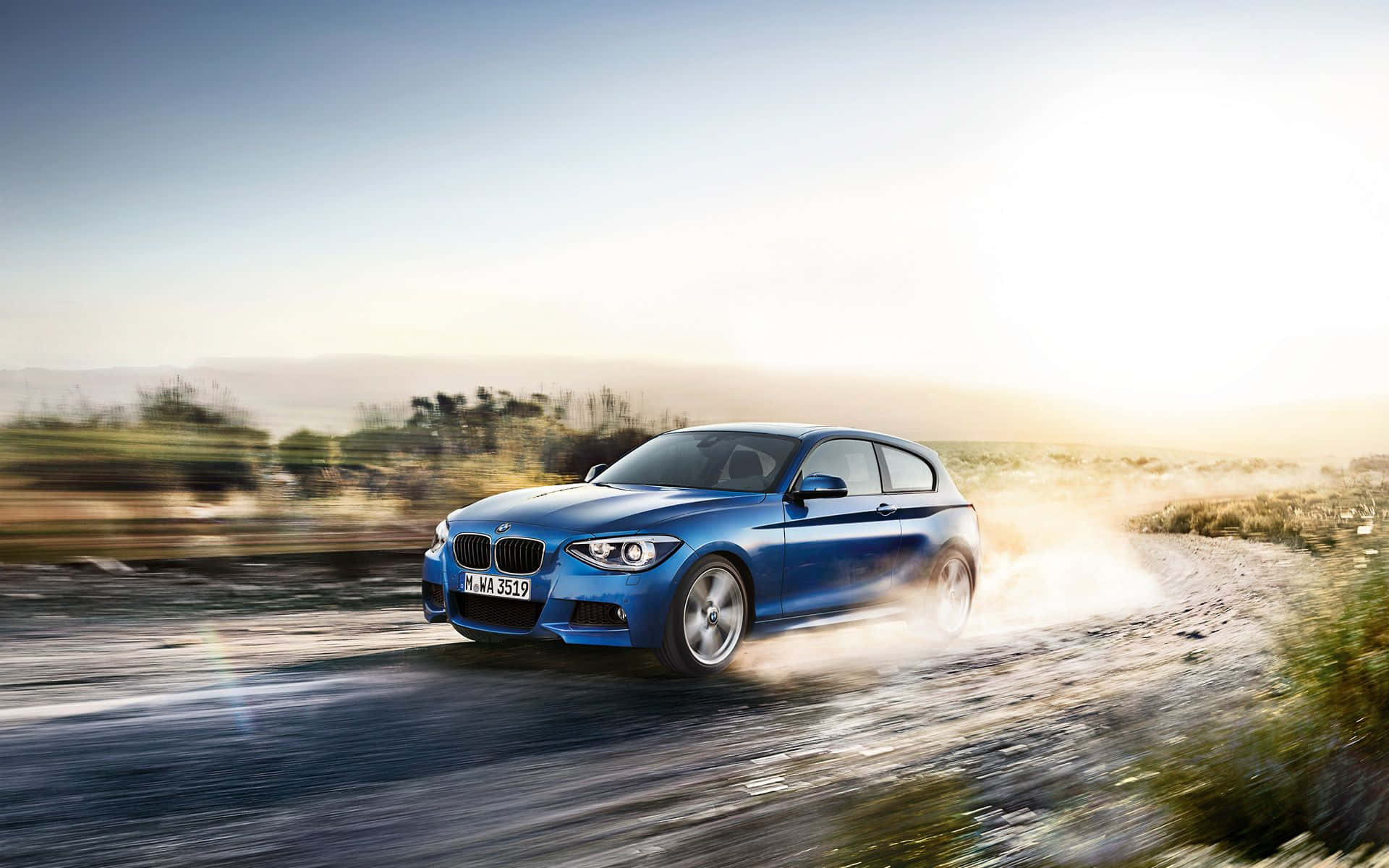 Sleek BMW 1 Series in Action Wallpaper