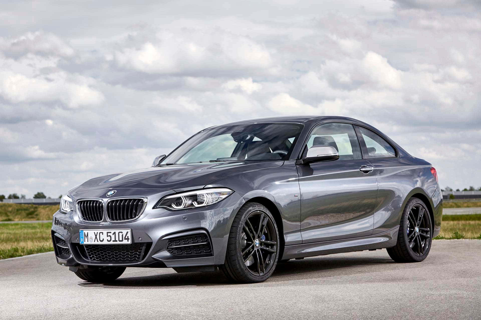 Sleek BMW 2 Series in urban setting Wallpaper