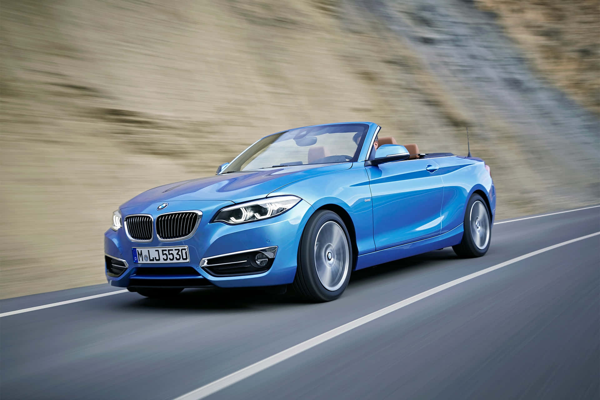 Sleek BMW 2 Series in the Spotlight Wallpaper