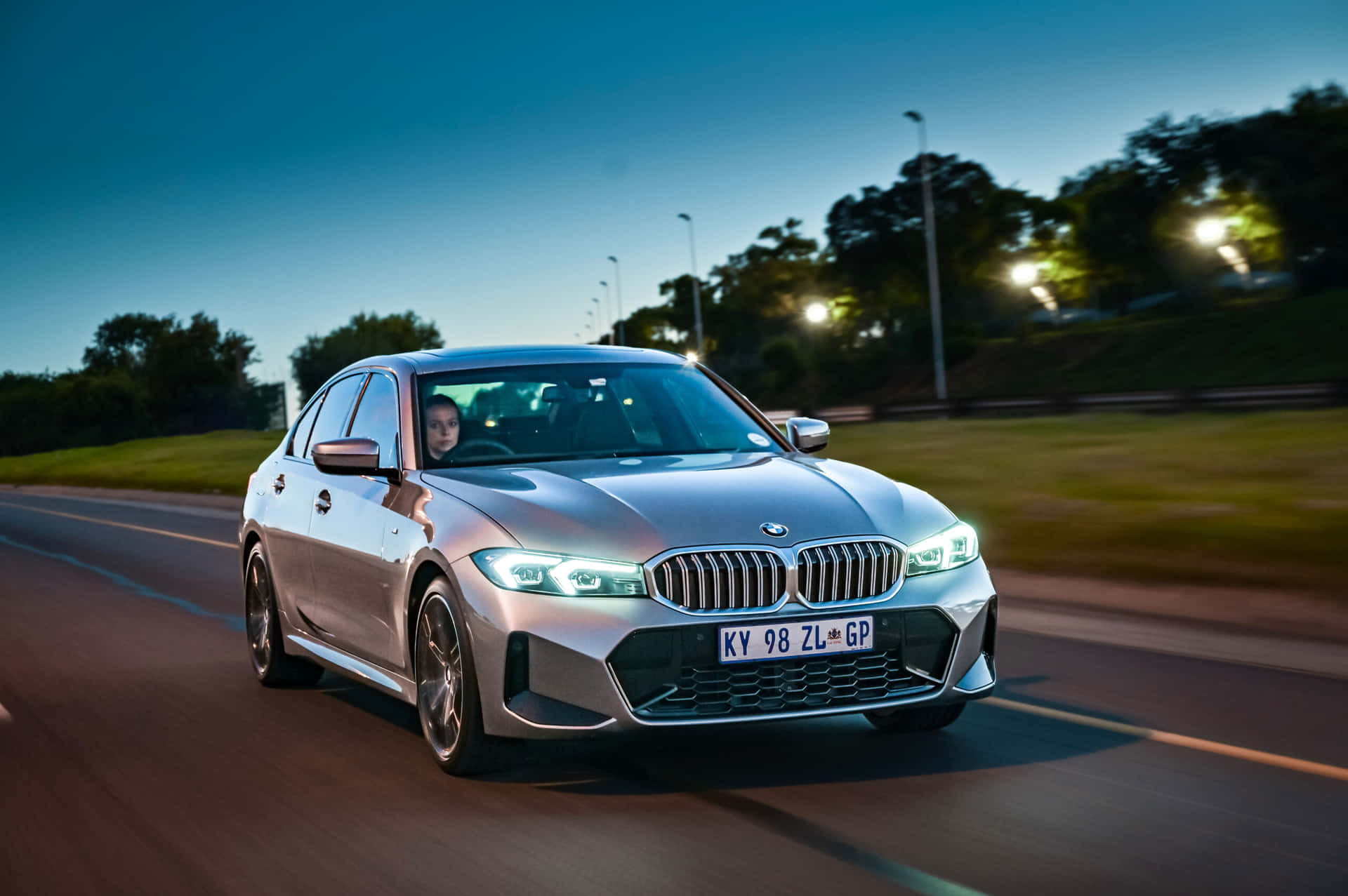 Sleek BMW 3 Series in Motion Wallpaper