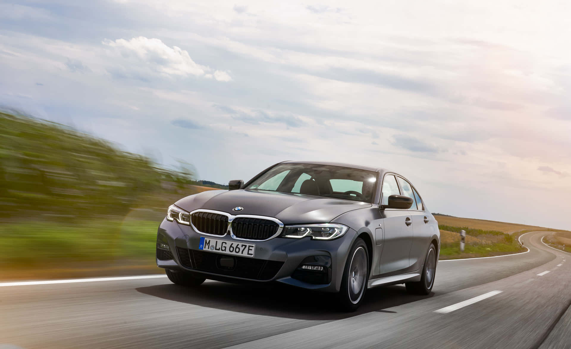 Captivating BMW 3 Series in Motion Wallpaper