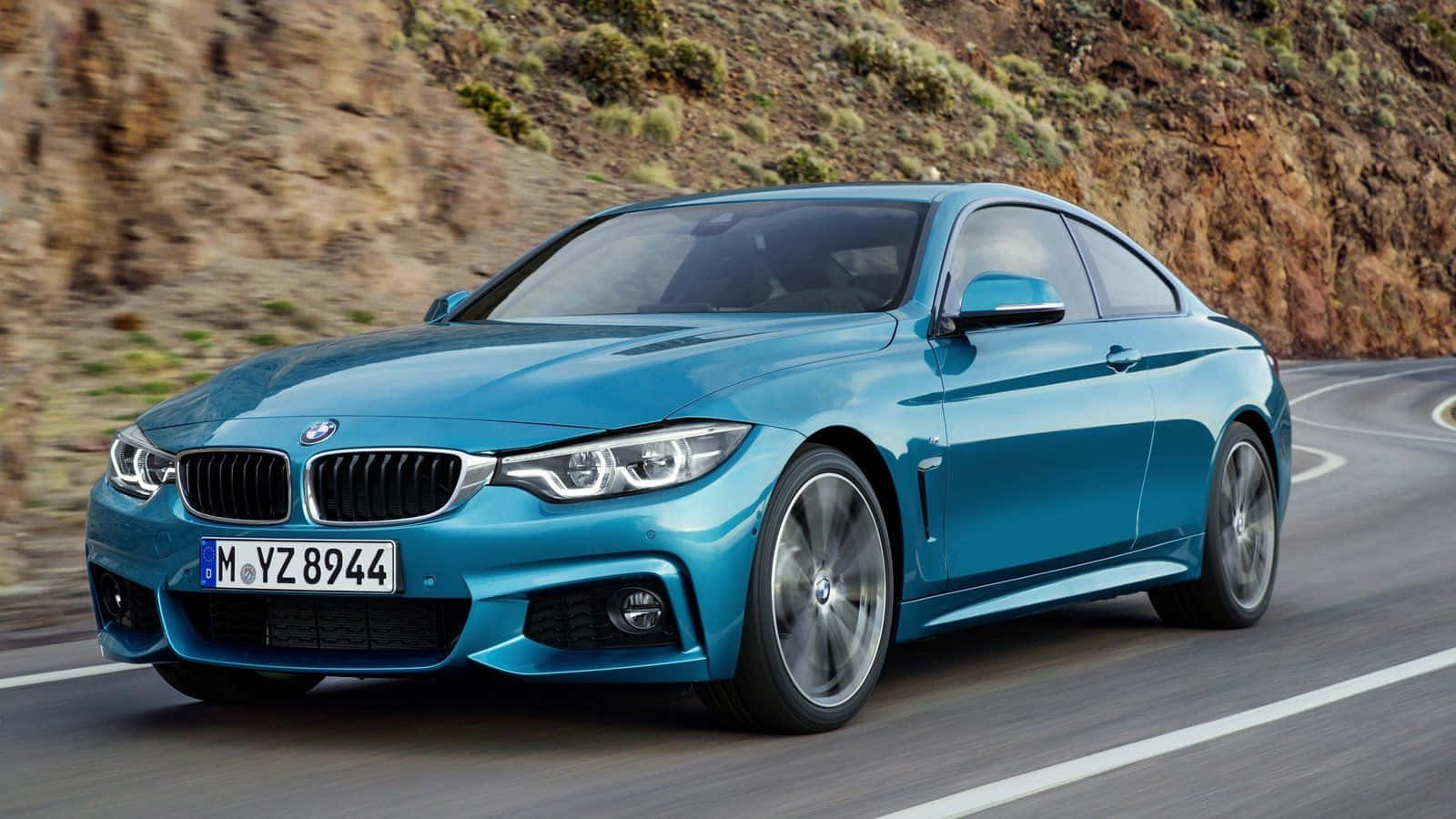 Sleek BMW 4 Series in Urban Setting Wallpaper