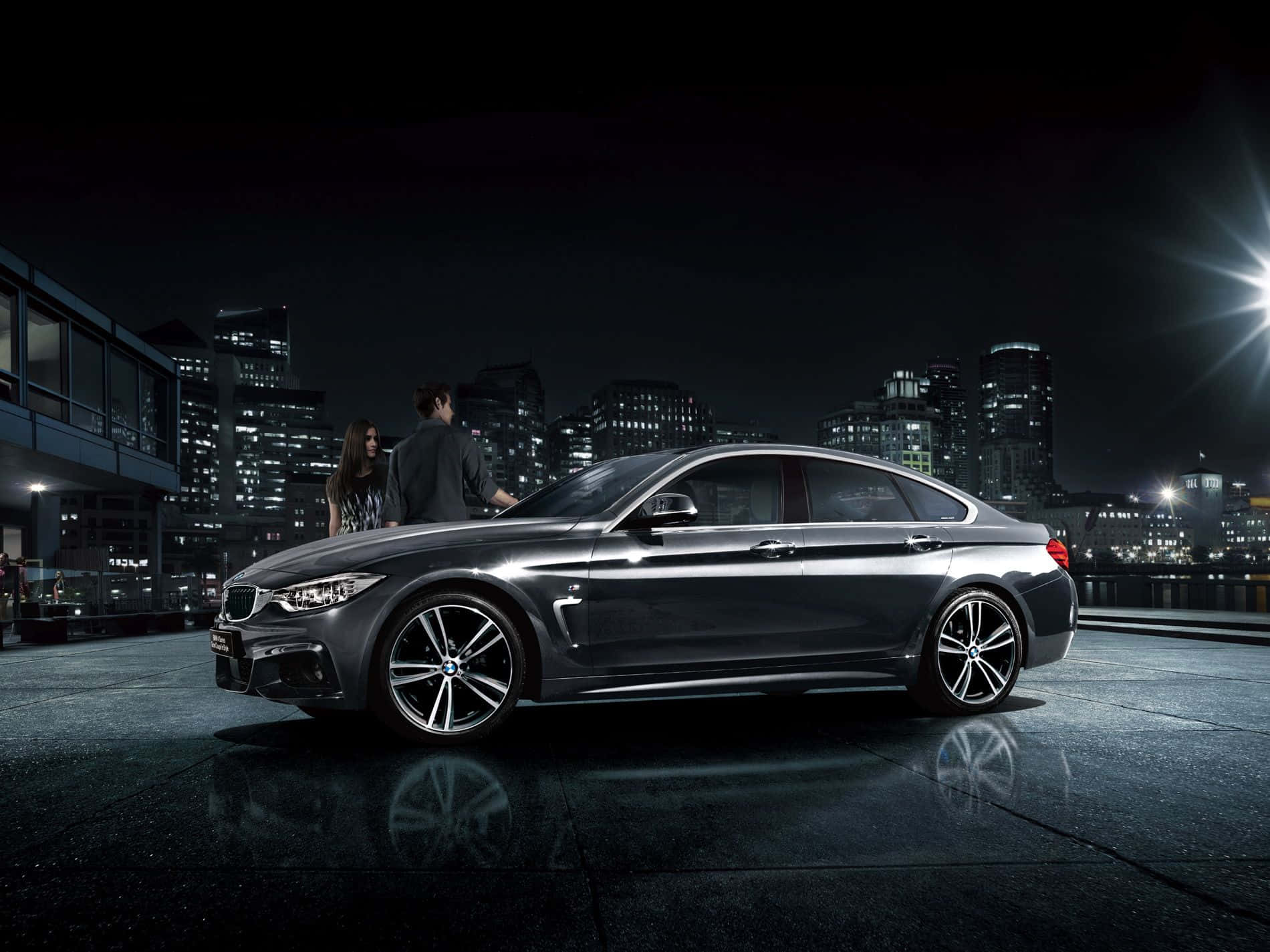 A stylish BMW 4 Series Coupe on the road Wallpaper