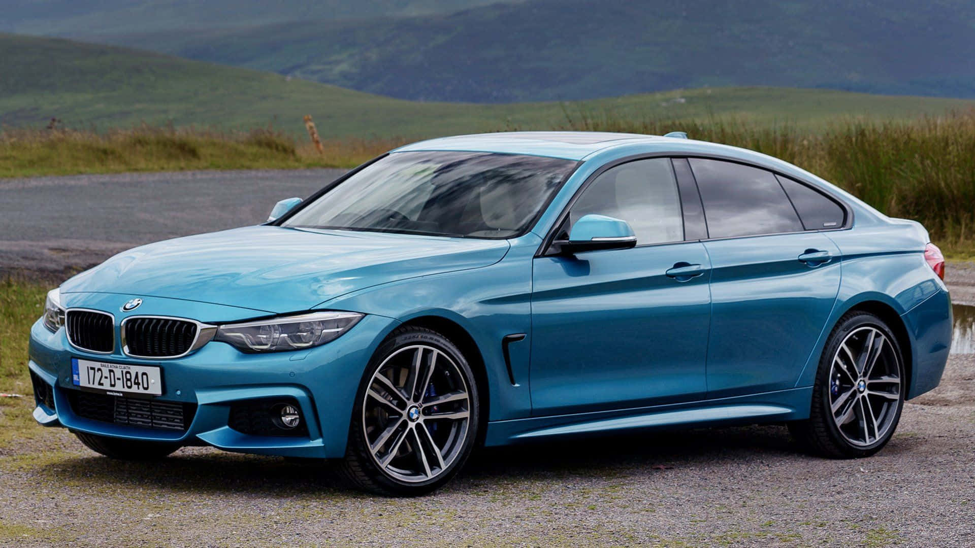 Elegant BMW 4 Series cruising the streets Wallpaper