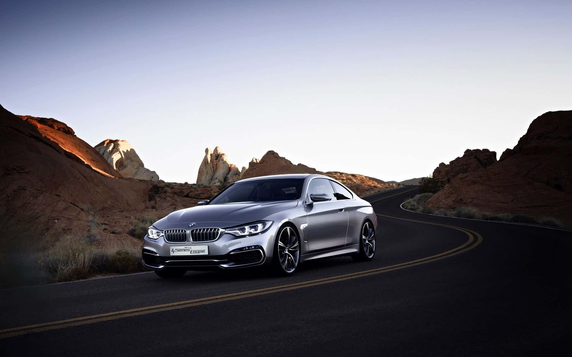 Sleek BMW 4 Series in a Vibrant Cityscape Wallpaper