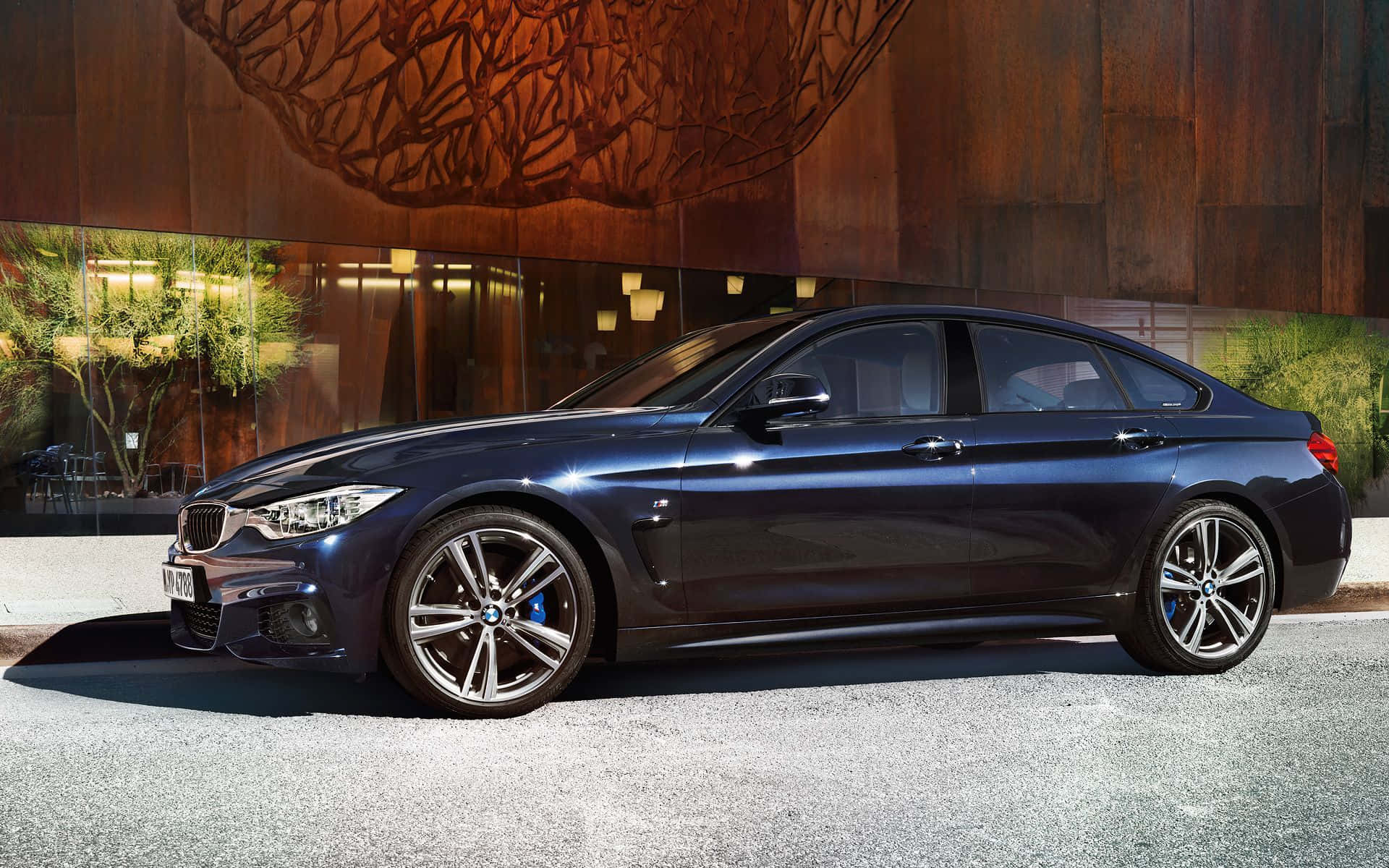 Sleek and Stylish BMW 4 Series in Motion Wallpaper