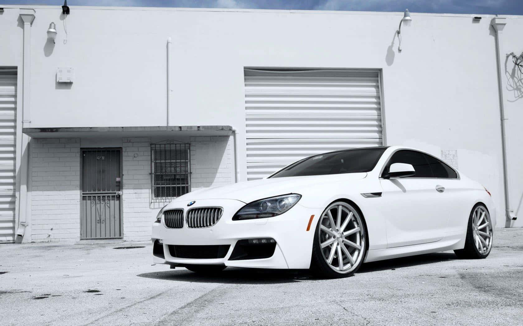 Sleek and Stylish BMW 6 Series in Action Wallpaper