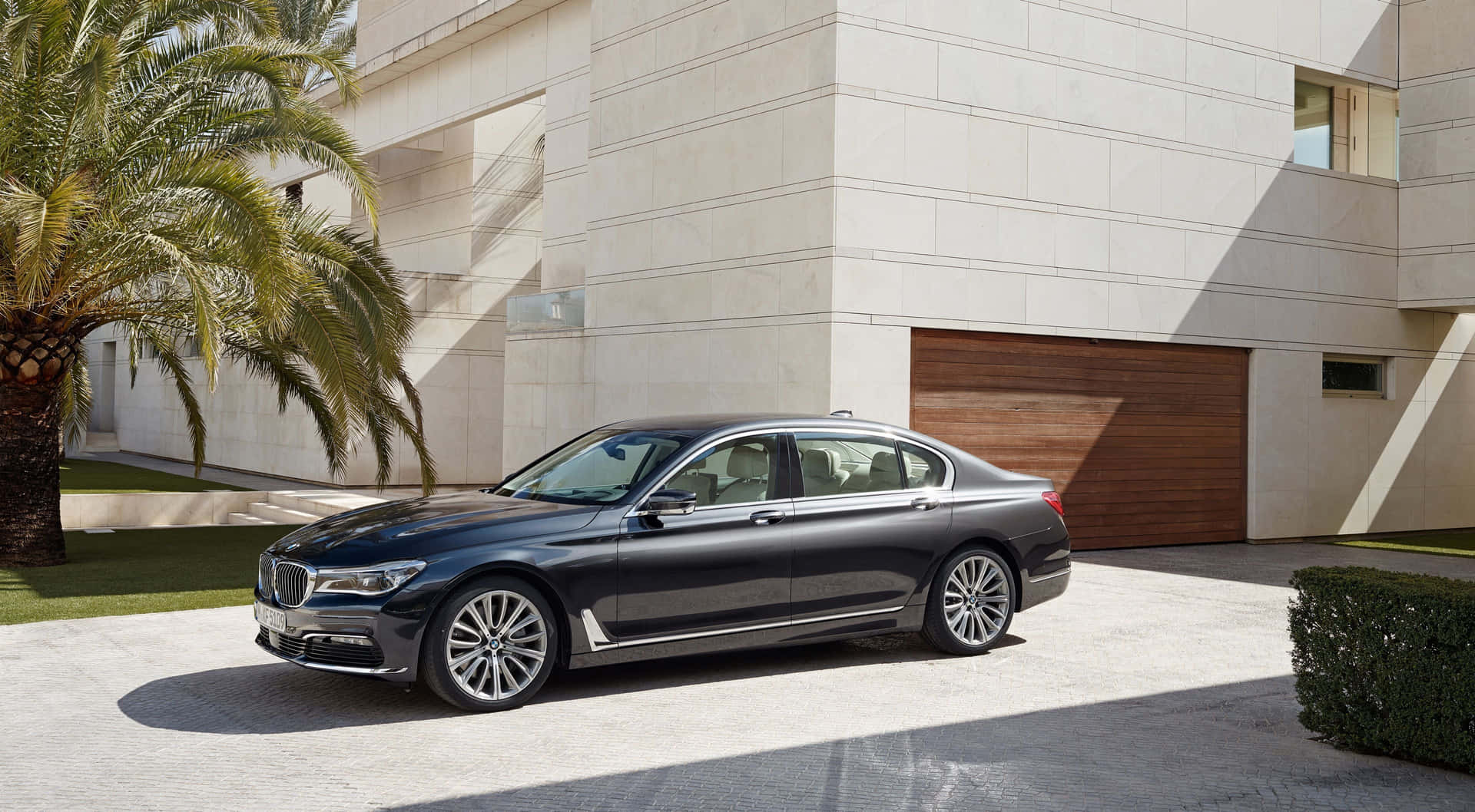 Sleek and Luxurious BMW 7 Series Sedan in Action Wallpaper