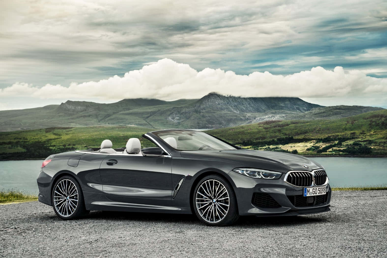 Sleek BMW 8 Series Cruising on the Open Road Wallpaper