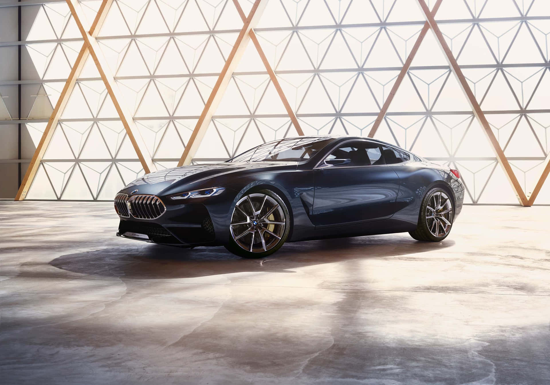 Sleek and Sporty BMW 8 Series Coupe in Action Wallpaper