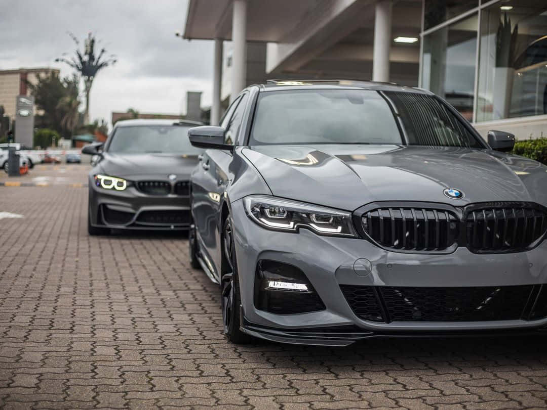 Grå BMW-biler symmetrisk tapet Wallpaper