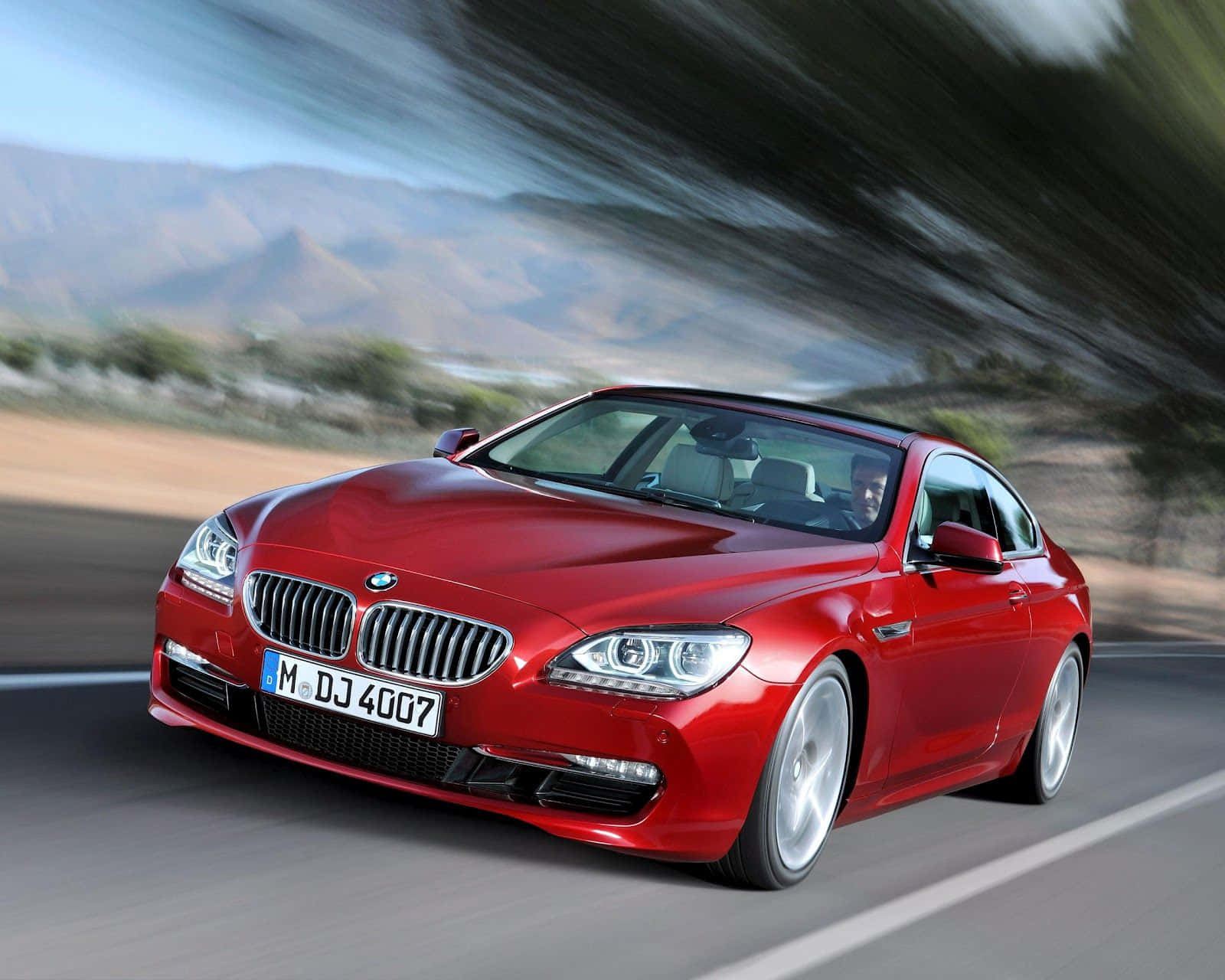 Accelerer dine drømme i en BMW Wallpaper