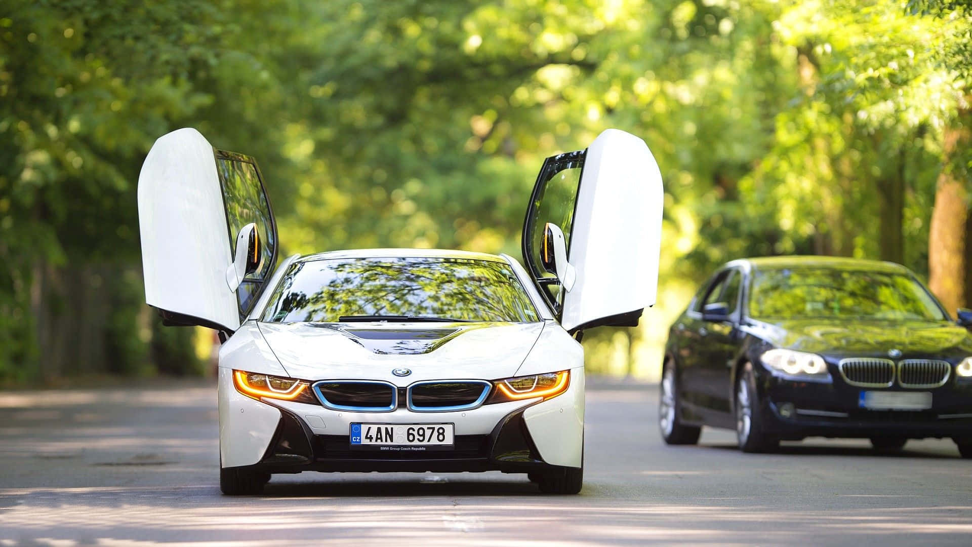 White Bmw Car With Gull-wing Doors Wallpaper