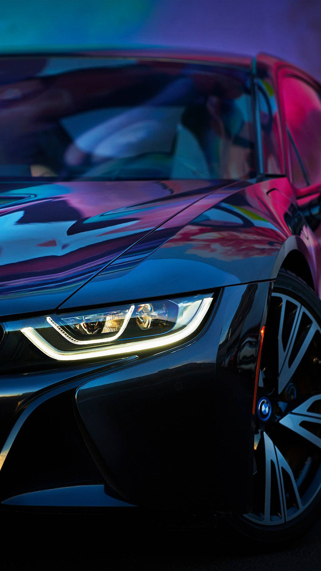 The BMW i8 revolutionizing the world with its advanced hybrid powertrain. Wallpaper