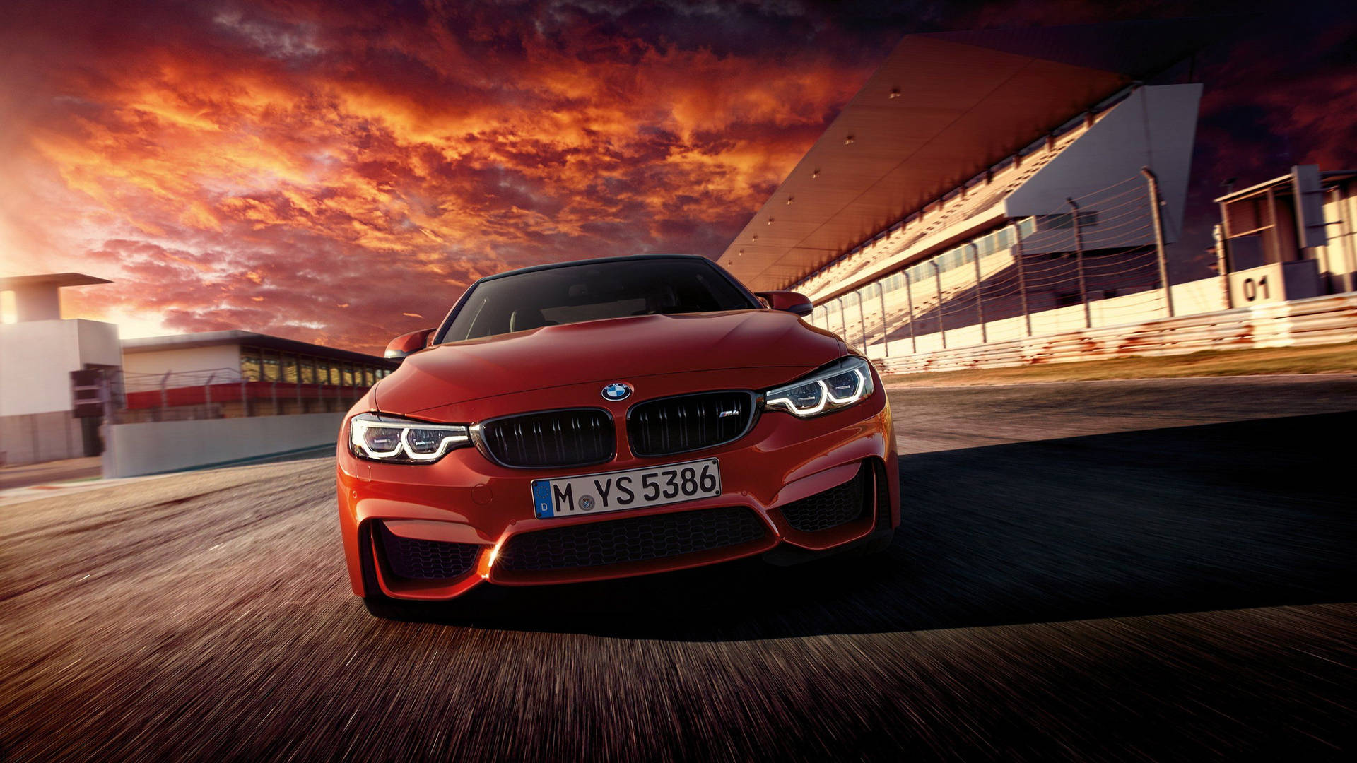 Experience the thrill of driving in BMW M4 Coupe Wallpaper